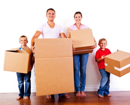 Loading items into a moving truck for storage